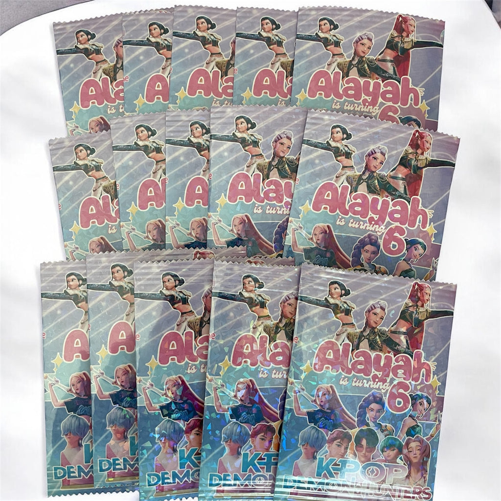 Collection of personalized party favor bags with 'Alayah is turning 6' text and graphics.